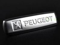 Эмблема Peugeot из полированного алюминия для ковриков салона - 1 шт., 18х64 мм